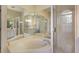 Spa-like bathroom featuring corner tub and walk-in shower at 3649 Wilderness W Blvd, Parrish, FL 34219