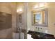 Modern bathroom with glass shower, vessel sink, and granite countertop at 3649 Wilderness W Blvd, Parrish, FL 34219