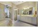 Elegant bathroom with soaking tub, shower, and updated vanity at 3649 Wilderness W Blvd, Parrish, FL 34219