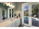 Bathroom with pool view and updated vanity at 3649 Wilderness W Blvd, Parrish, FL 34219