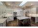 Modern kitchen featuring stainless steel appliances and an island at 3649 Wilderness W Blvd, Parrish, FL 34219