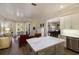 Open kitchen with island and views into adjacent living space at 3649 Wilderness W Blvd, Parrish, FL 34219