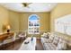 Bright home office features hardwood floors, ceiling fan and large window with shutters at 3649 Wilderness W Blvd, Parrish, FL 34219