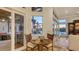 Cozy breakfast nook with views of the outdoor area and waterfront at 400 N Washington Dr, Sarasota, FL 34236