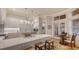 Gourmet kitchen with stone countertops, stainless appliances and eat in bar at 400 N Washington Dr, Sarasota, FL 34236