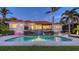Waterfront home with a backyard pool and a cascading water feature at 400 N Washington Dr, Sarasota, FL 34236