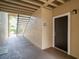 Building entrance with dark brown door and nearby stairs at 4001 Crockers Lake Blvd # 11, Sarasota, FL 34238
