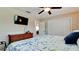 Bedroom with a queen bed and wicker dresser at 4010 18Th W Ave, Bradenton, FL 34205