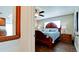 Guest bedroom with wooden bed frame and tile floors at 4010 18Th W Ave, Bradenton, FL 34205