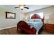 Guest bedroom with wooden bed frame and tile floors at 4010 18Th W Ave, Bradenton, FL 34205