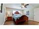 Guest bedroom with a wooden bed frame and tile floors at 4010 18Th W Ave, Bradenton, FL 34205