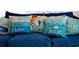 Blue couch with beach themed pillows at 4010 18Th W Ave, Bradenton, FL 34205