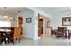 Bright dining room with wicker chairs and table, adjacent to kitchen at 4010 18Th W Ave, Bradenton, FL 34205
