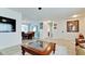Open floor plan with living and dining areas, featuring hardwood floors at 4010 18Th W Ave, Bradenton, FL 34205