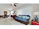 Relaxing living room with blue couch and beach-themed decor at 4010 18Th W Ave, Bradenton, FL 34205