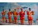 Beach themed wall art with women carrying wine at 4010 18Th W Ave, Bradenton, FL 34205