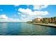 Waterfront view with boardwalk, buildings, and bridge at 4010 18Th W Ave, Bradenton, FL 34205