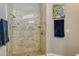 Large walk-in shower with neutral tile and glass enclosure at 4066 Via Mirada, Sarasota, FL 34238