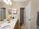 Double vanity bathroom with separate toilet area at 4153 Lenox Blvd, Venice, FL 34293