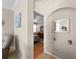 View into bedroom from hallway, showing wood floors at 4153 Lenox Blvd, Venice, FL 34293