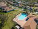 Aerial view of community pool and surrounding area at 4153 Lenox Blvd, Venice, FL 34293