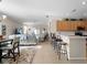 Open kitchen with breakfast bar overlooks the living and dining areas at 4153 Lenox Blvd, Venice, FL 34293