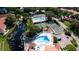 Community features pools, tennis courts, and a peaceful lake at 4515 45Th W Ave # 201A, Bradenton, FL 34210