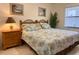 Bedroom with king-size bed and coastal decor at 4515 45Th W Ave # 201A, Bradenton, FL 34210