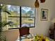Enjoy a tranquil water view from this bright dining area at 4515 45Th W Ave # 201A, Bradenton, FL 34210