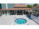 Community hot tub with surrounding patio at 4515 45Th W Ave # 201A, Bradenton, FL 34210