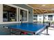 Covered patio features a ping pong table at 4515 45Th W Ave # 201A, Bradenton, FL 34210