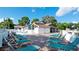 Plenty of lounge chairs around the pool at 4515 45Th W Ave # 201A, Bradenton, FL 34210