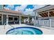 Community spa with surrounding patio seating at 4515 45Th W Ave # 201A, Bradenton, FL 34210