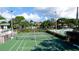 Community tennis court with surrounding fence at 4515 45Th W Ave # 201A, Bradenton, FL 34210