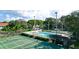 Aerial view of community tennis courts and pool at 4515 45Th W Ave # 201A, Bradenton, FL 34210