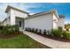 Home exterior features well-maintained landscaping and a clean sidewalk leading to the entrance at 4739 Willow Bend Ave, Parrish, FL 34219