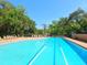 Large community pool with ample deck space for lounging at 5244 Marsh Field Rd # 6, Sarasota, FL 34235
