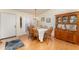Inviting dining room with warm lighting, classic furnishings, and a welcoming atmosphere for Gathering meals at 6314 29Th W Ave, Bradenton, FL 34209