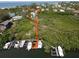 Elevated view showcasing home's access to a private dock and marina at 6330 Laguna Dr, Longboat Key, FL 34228
