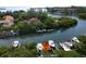 Waterfront lot with multiple boat slips and canal views at 6330 Laguna Dr, Longboat Key, FL 34228