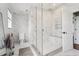 Spa-like bathroom with walk-in shower and marble tile at 6330 Laguna Dr, Longboat Key, FL 34228