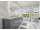 Luxury bathroom with marble finishes and a large shower at 6330 Laguna Dr, Longboat Key, FL 34228