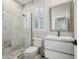 Clean bathroom with marble shower and modern vanity at 6330 Laguna Dr, Longboat Key, FL 34228