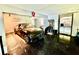 Finished garage with car lift, game machine and refrigerator at 6330 Laguna Dr, Longboat Key, FL 34228
