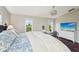 Main bedroom with large bed, ample light, and stylish decor at 6330 Laguna Dr, Longboat Key, FL 34228