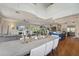 Combined living, kitchen and dining areas creating a seamless space at 6330 Laguna Dr, Longboat Key, FL 34228