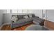 Relaxing sitting area with sectional sofa and coffee table at 6330 Laguna Dr, Longboat Key, FL 34228