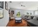 Cozy sitting area with hardwood floors and comfy seating at 6330 Laguna Dr, Longboat Key, FL 34228