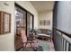 Private balcony with seating and kitchen view at 6430 Sun Eagle Ln # 201, Bradenton, FL 34210