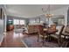 Elegant dining room with hardwood floors and chandelier at 6430 Sun Eagle Ln # 201, Bradenton, FL 34210